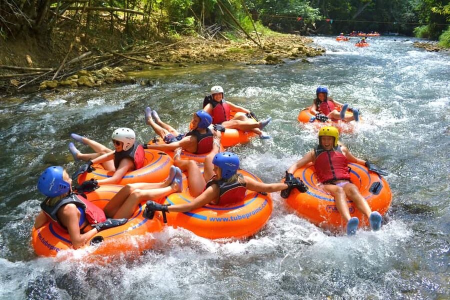 Montego Bay: River Tubing & Bamboo Beach Club VIP Access - Floating through gentle Jamaican rapids
