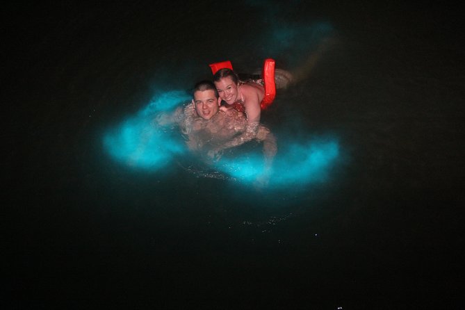 Mystic Luminescent Lagoon Night Cruise & Swim in Jamaica - Swimming in the glowing water