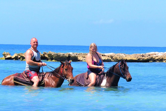 Negril 45-minute Guided Horseback Ride and Swim - Riding through the countryside