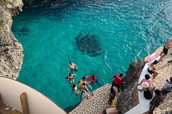 Negril 7 mile Beach, Party Catamaran Cruise and Ricks Cafe Combo - A flexible alternative without the boat