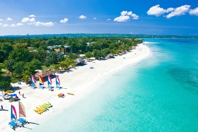 Negril Beach Experience and Rick's Café Combo Tour Negril - Sunset, Reggae, Food, and the Pool