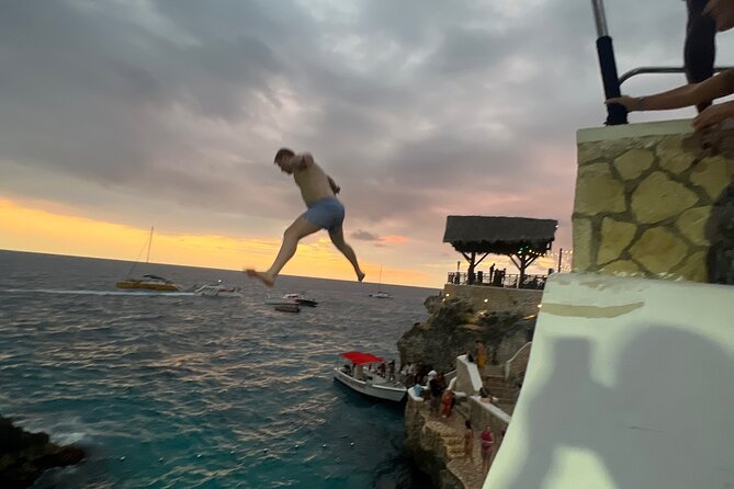 Negril Private Day Tour: ATV Ride, Party Catamaran & Ricks Cafe - Rick’s Cafe for Cliffs, Music, and Sunset