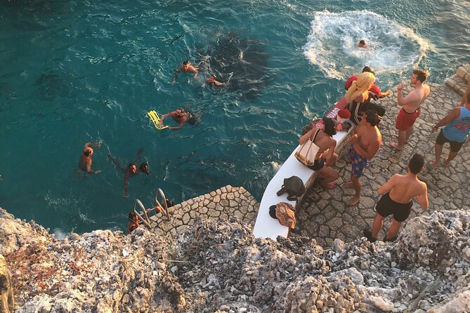 Negril Seven Miles Beach, Snorkeling, Boat Ride, Ricks Cafe Combo - Glass-bottom boat and snorkeling near the reef