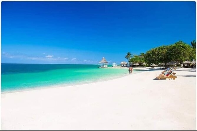 Negril Seven Miles Beach, Snorkeling, Boat Ride, Ricks Cafe Combo - Margaritaville for beach time and people-watching