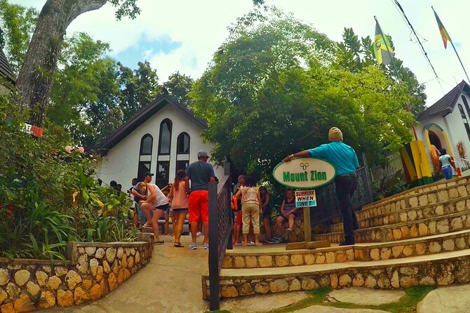 Nine Miles “Bob Marley’s Birthplace” and River Tubing from Montego Bay - Swimming and the rope swing stop