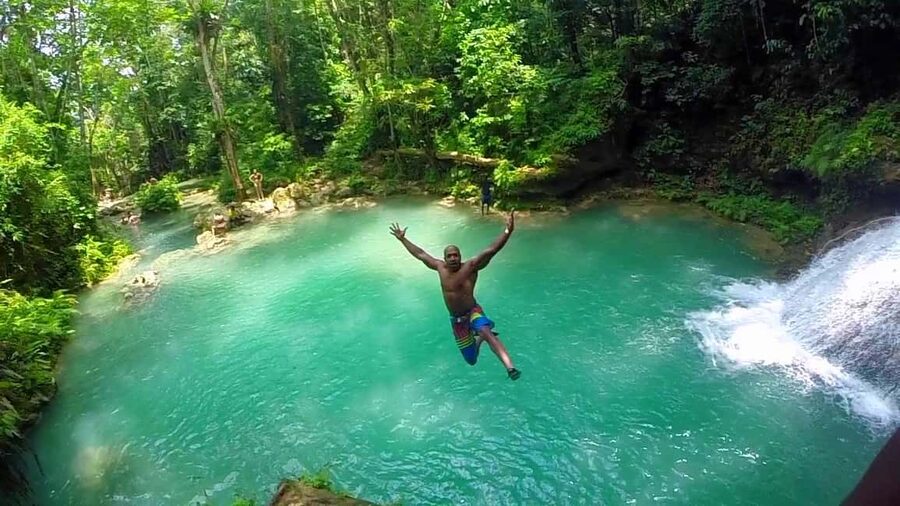 Ocho Rios: Blue Hole, Dunn’s River & Reggae Hill Guided Tour - Blue Hole: clear water, small falls, and slippery footing