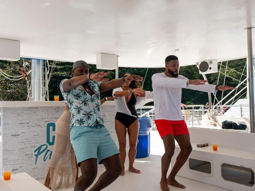 Ocho Rios: Catamaran Sail & Snorkel + Dunn's River Climb - Island Village, Jamaican lunch, and ocean views