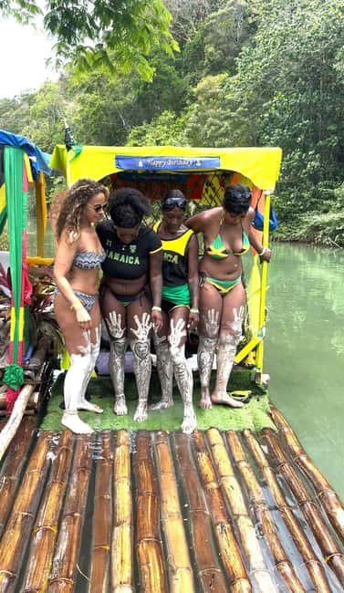 Ocho Rios Jamaica: River Bamboo Rafting Activity - Coconut water, clear river views, and the work of the captain