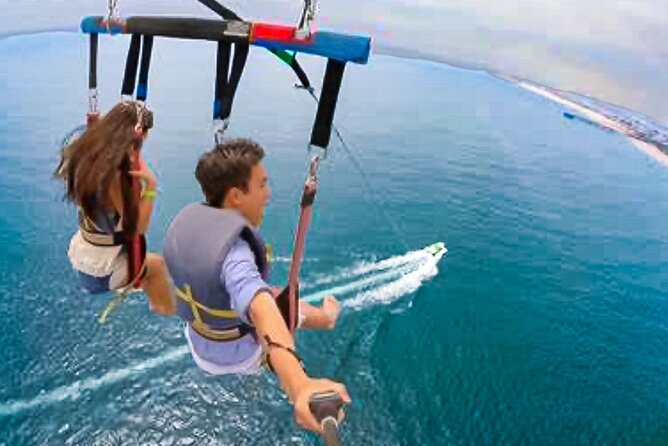 Parasailing above Turquoise Ocean Waters in Montego Bay - Your Ride to the Water With Private Transportation