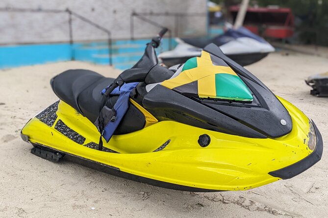 Parasailing, Sea Tubing & Jet Ski from Montego Bay- Private tour - Sea tubing behind a speedboat