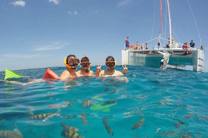 Party Catamaran Cruise with Open Bar and Snorkeling Montego Bay - Three hours of music, dancing, and coastal views