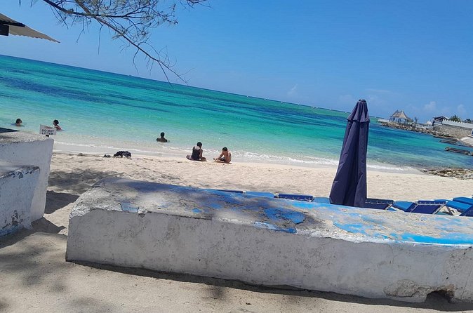 Private Car Tour to Negril Jamaica - Rick’s Cafe for food, music, and cliff jumping