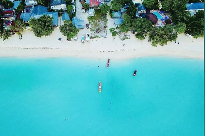 Private Roundtrip Hotel Transfers to Doctors Cave Beach Club - Four Hours for Swimming, Sand, and Water Activities