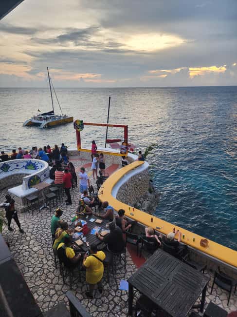Ricks cafe & 7mile Beach Day Tour From Montego Bay. - Languages, Flexibility, and Booking Details