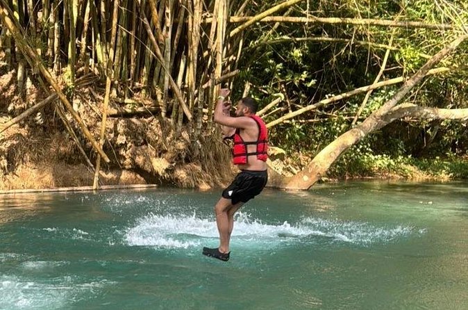 River Rapids Tubing and Beach Visit with Private Transportation - Swimming, jumping, and guide support