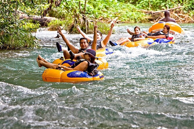 River Rapids Tubing and Beach Visit with Private Transportation - Tubing the Rio Bueno at an easy pace