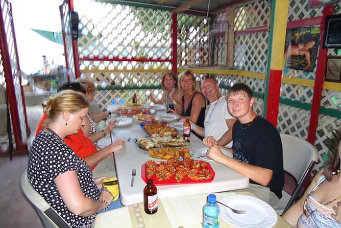 Taste of Jamaica Food Tour from Ocho Rios - A fruit stand with coconut water and sugar cane