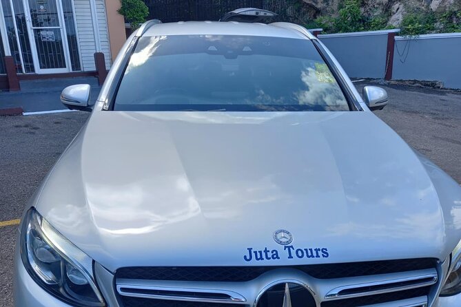 VIP Luxury Montego Bay Airport Transfer to Montego Bay/ Falmouth - Meeting your driver at Montego Bay Airport